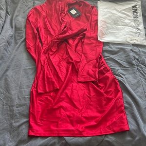 I am selling a Red XL Fashion Nova Dress. Never worn. Has some stretch to it.